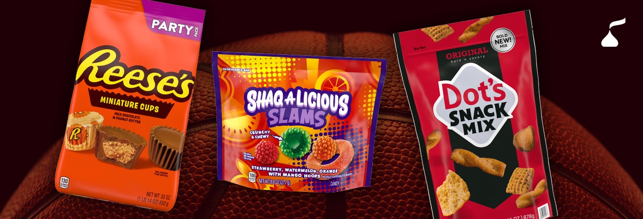 Hershey's candy packages in front of a basketball