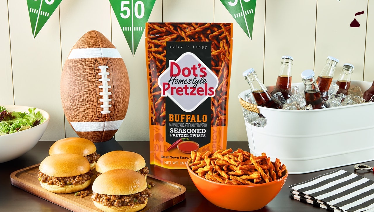 Dot's Homestyle Buffalo Pretzels next to pork sliders
