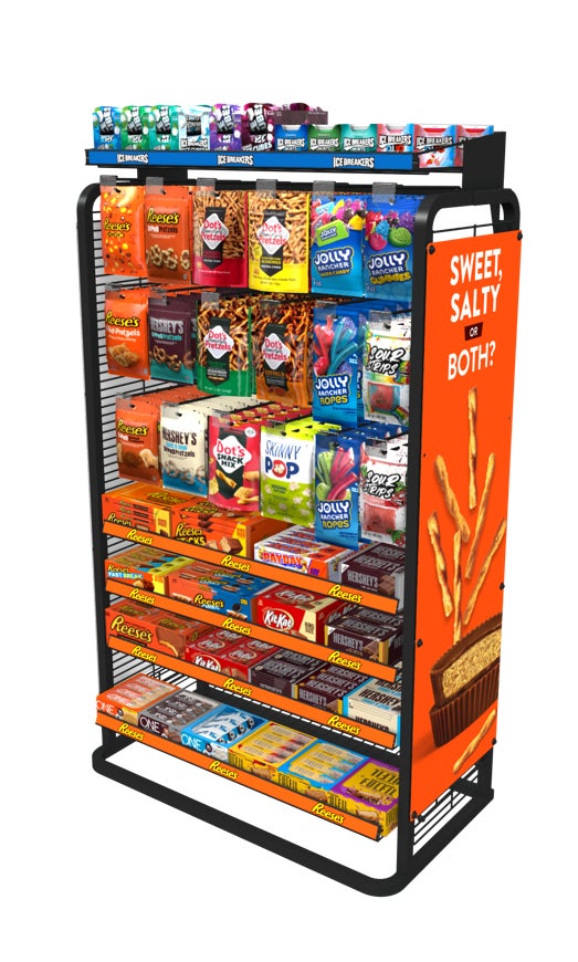 Hershey 360 End Cap display stocked with candy, sweets, gum, mint, salty snacks and protein bars under a “Sweet, Salty or Both?” header