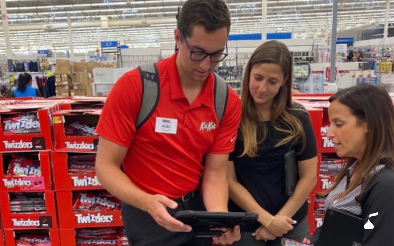 People looking at image on a tablet