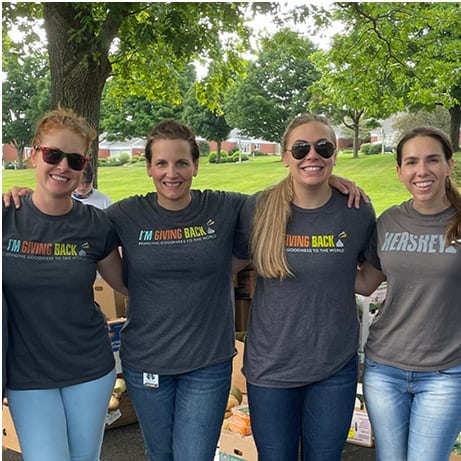 Volunteers gathered together in a community