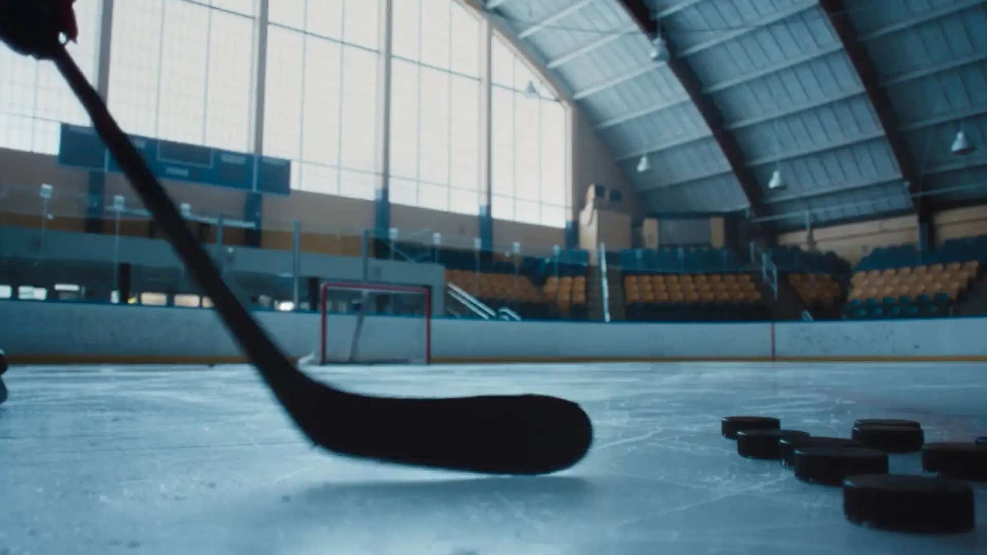 olympian hockey player doing shooting drills