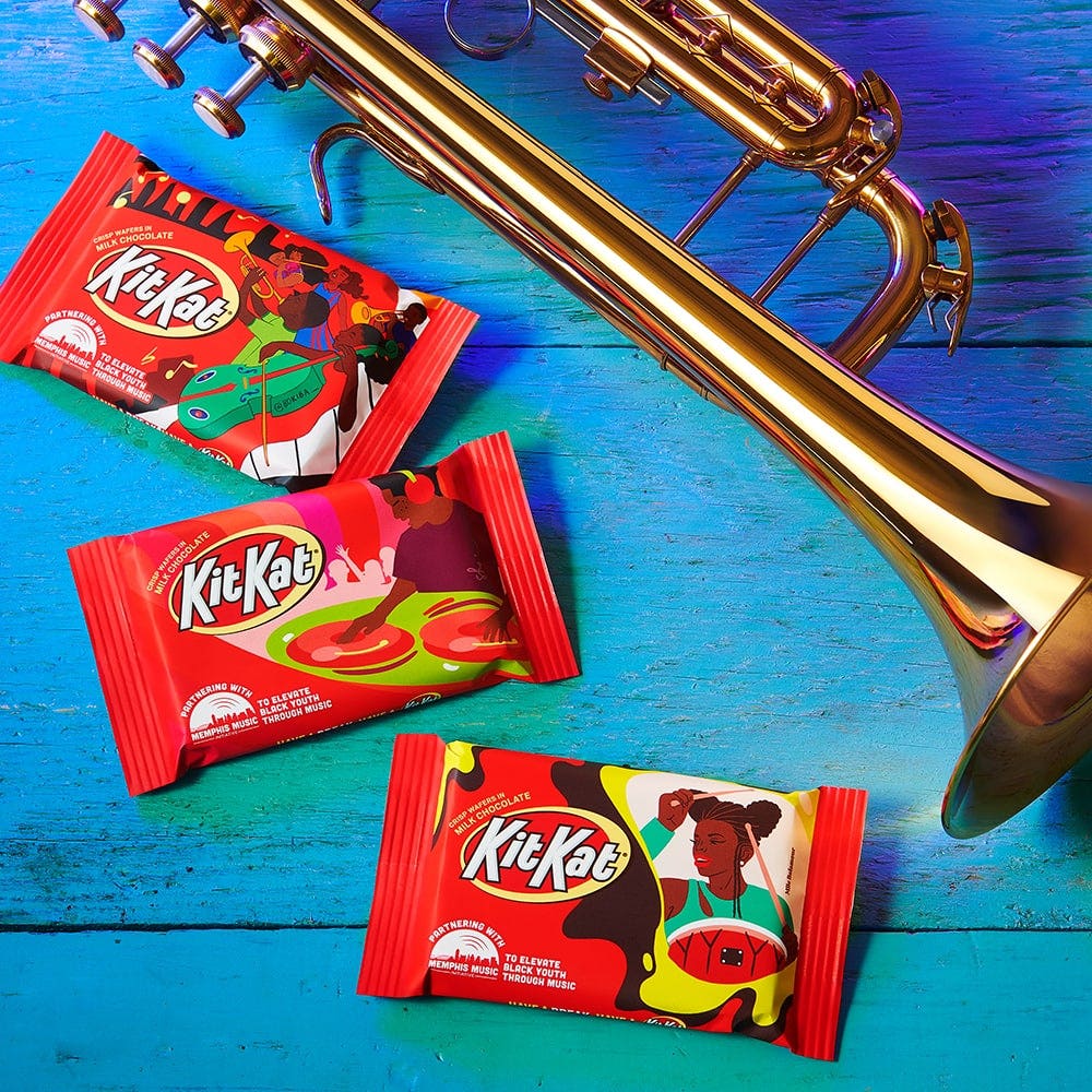 Kit Kat Candy Bars next to a trumpet